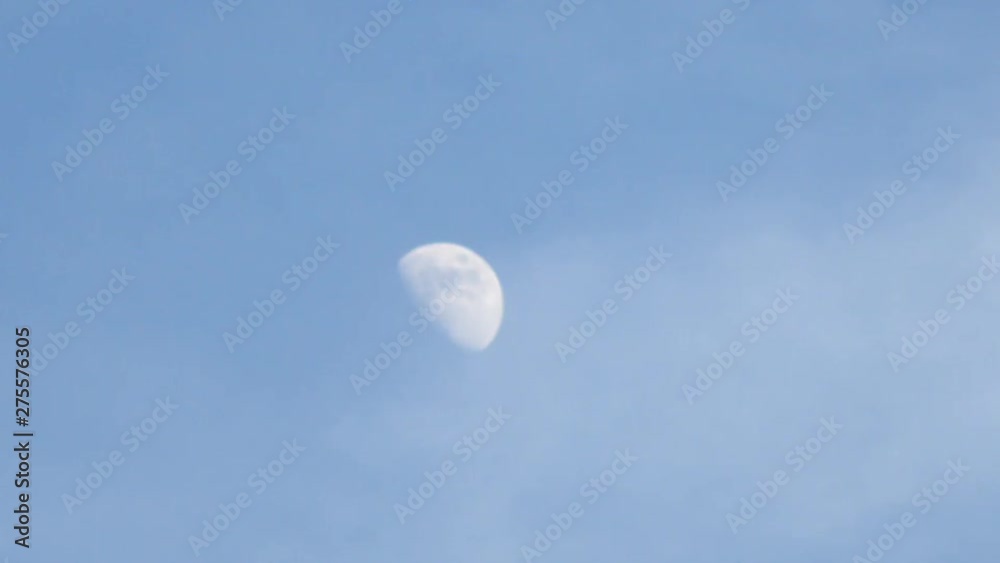 White moon with cloud moving in sunny day at real time White moon with cloud moving in sunny day at real time