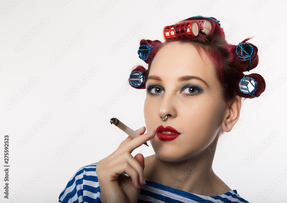 funy housewife with curlers smokes a cigarette. smoking break for sexy  lady. free space for your text foto de Stock | Adobe Stock