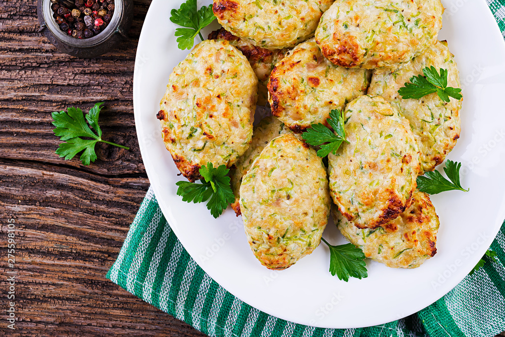 Chicken cutlet with zucchini. Healthy food. Top view Chicken cutlet with zucchini. Healthy food. Top view