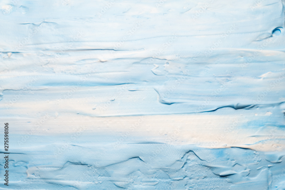 Obraz premium Blue and white acrylic paint. Sky and clouds effect abstract background. Colored mousse surface.
