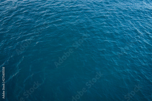Beach top view with pattern wave. Stock photo image of blue color deep ocean water, sea surface. Soft blue ocean wave, turquoise waves, clear water surface. Nature surface background texture design
