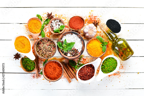 Fototapeta Naklejka Na Ścianę i Meble -  Various spices on white background. The word 