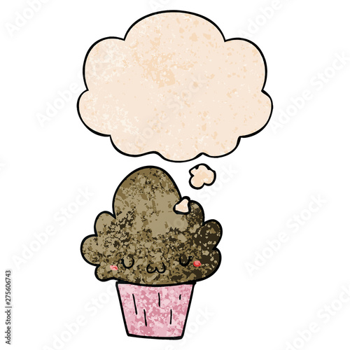 cartoon cupcake with face and thought bubble in grunge texture pattern style