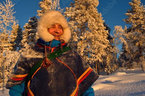 Nils-Torbjörn Nutti, owner and operator at Nutti Sámi Siida, during snowmobile trip into the wilderness, Jukkasjärvi, Lapland, Laponia, Norrbotten county, Sweden photo