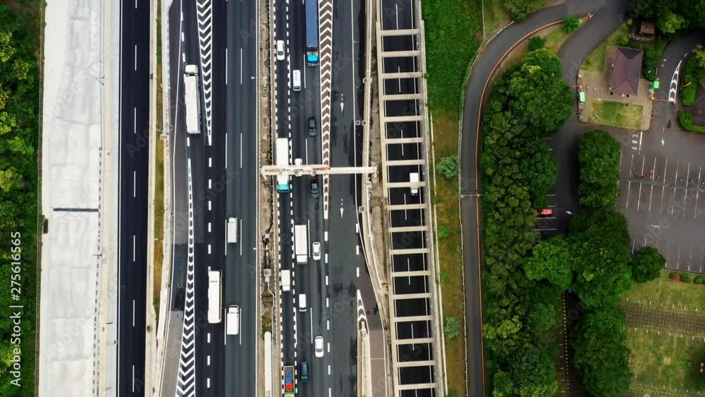 traffic with vehicle on the highway, aerial views of the city of Tokyo, Japan traffic with vehicle on the highway, aerial views of the city of Tokyo, Japan