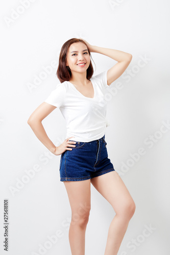 woman thai in t-shirt and jeans wall background