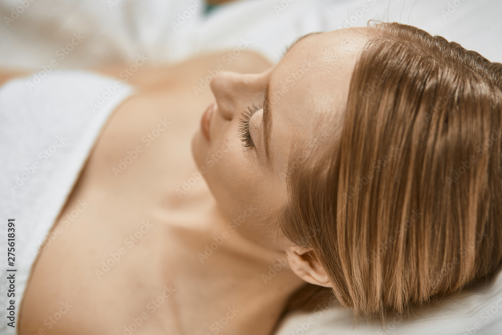 Beautiful young woman in cosmetic salon close up Beautiful young woman in cosmetic salon close up