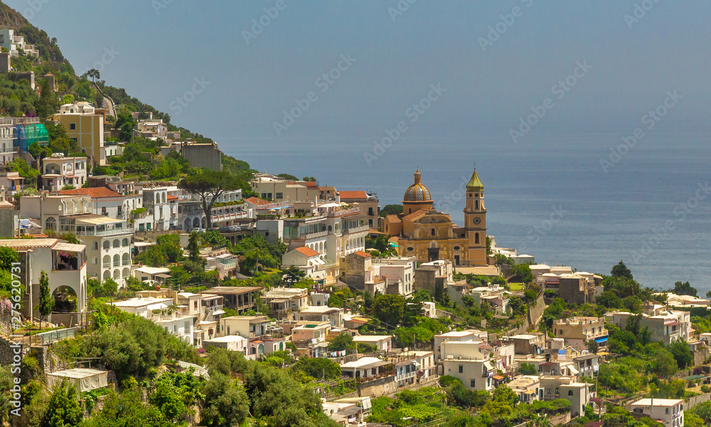 Positano Hill View. Beautiful view of Positano at daytime, with its colorful buildings along the hill. Amalfi coast situated in province of Salerno, in the region of Campania, Italy. Positano Hill View. Beautiful view of Positano at daytime, with its colorful buildings along the hill. Amalfi coast situated in province of Salerno, in the region of Campania, Italy.