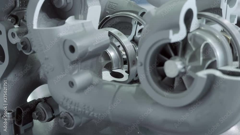 Structure of new automotive turbines to increase engine power is presented for review at the exhibition. Shot in motion Structure of new automotive turbines to increase engine power is presented for review at the exhibition. Shot in motion