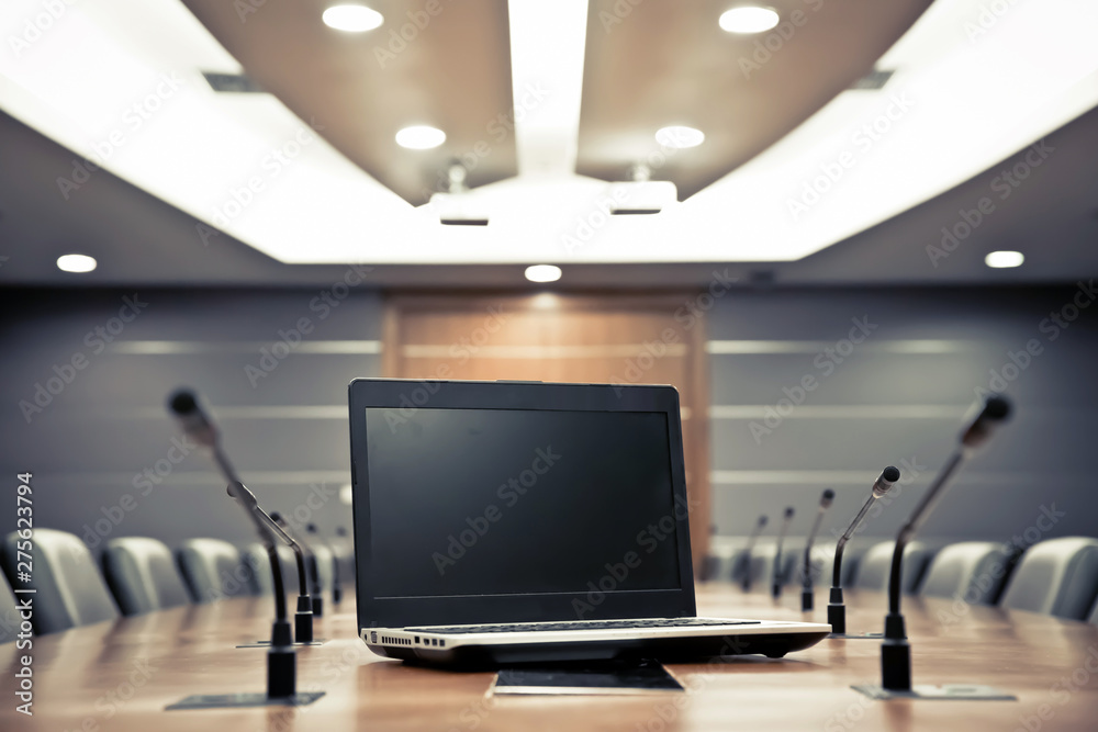 Notebook with Professional microphone in the meeting room Notebook with Professional microphone in the meeting room