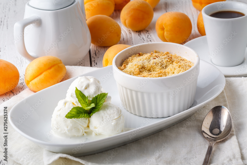 Freshly baked crumble with vanilla ice cream Freshly baked crumble with vanilla ice cream
