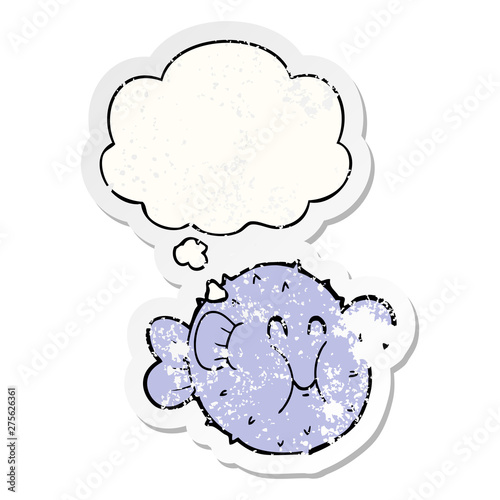 cartoon puffer fish and thought bubble as a distressed worn sticker