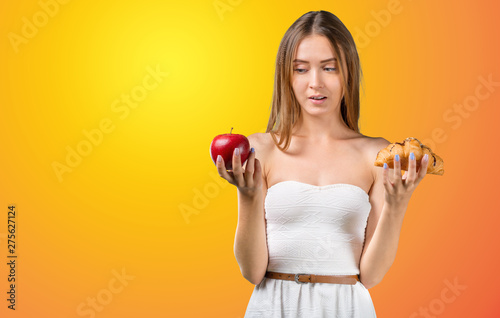 Portrait of girl with red apple  isolated