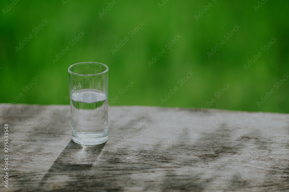 Close up the purified fresh drink water from the bottle on table 