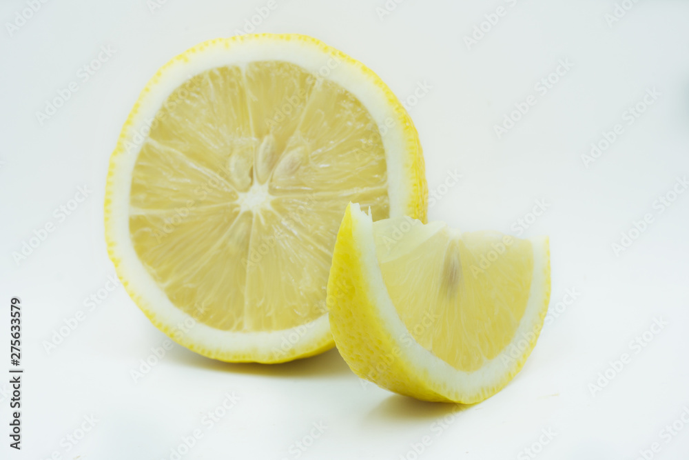 lemon with slices isolated on white background. healthy food lemon with slices isolated on white background. healthy food