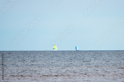 Yachts on horizon in Baltic sea.