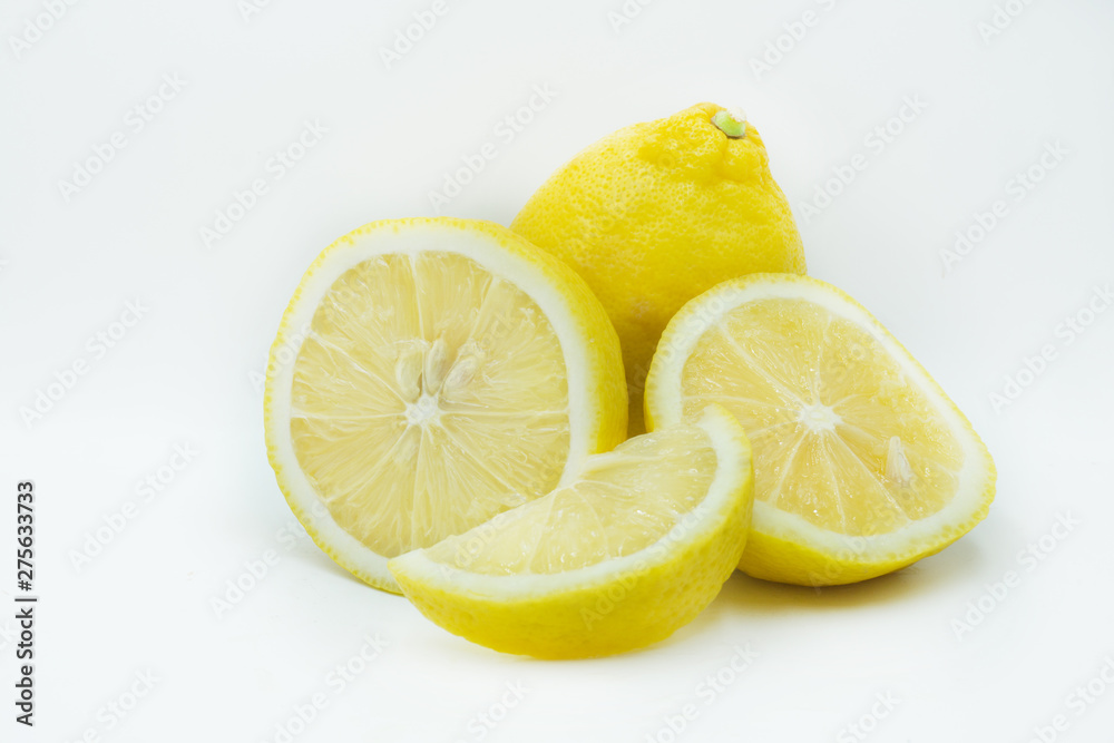 lemon with slices isolated on white background. healthy food lemon with slices isolated on white background. healthy food