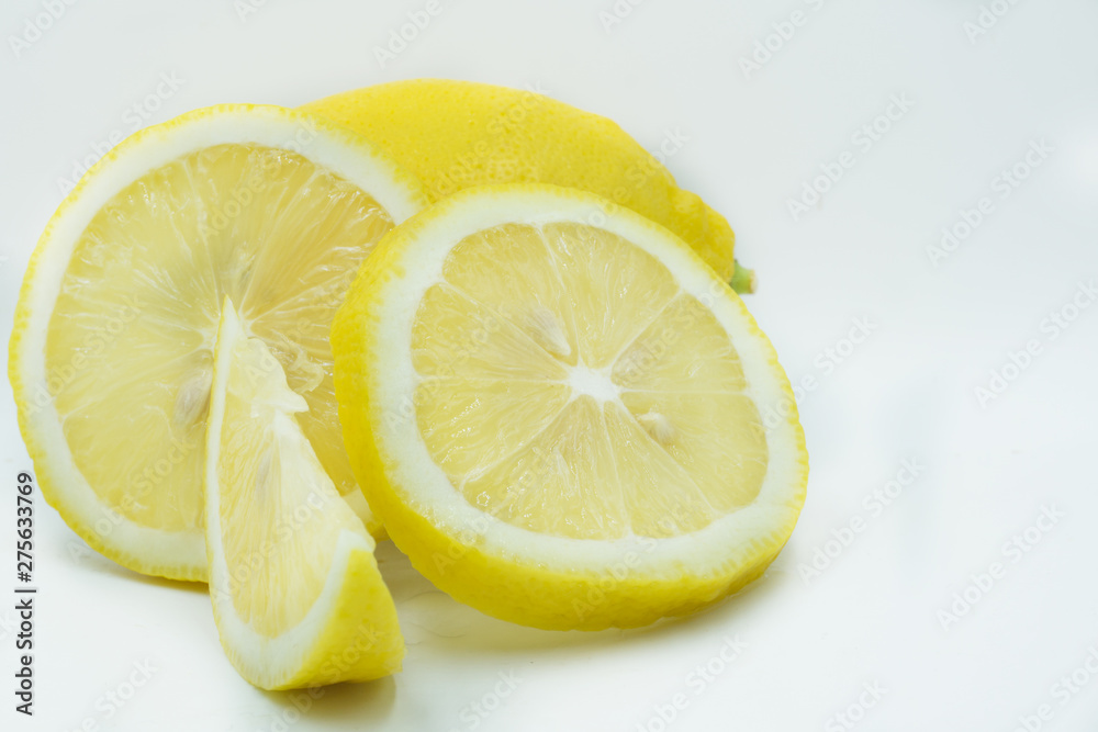 lemon with slices isolated on white background. healthy food lemon with slices isolated on white background. healthy food
