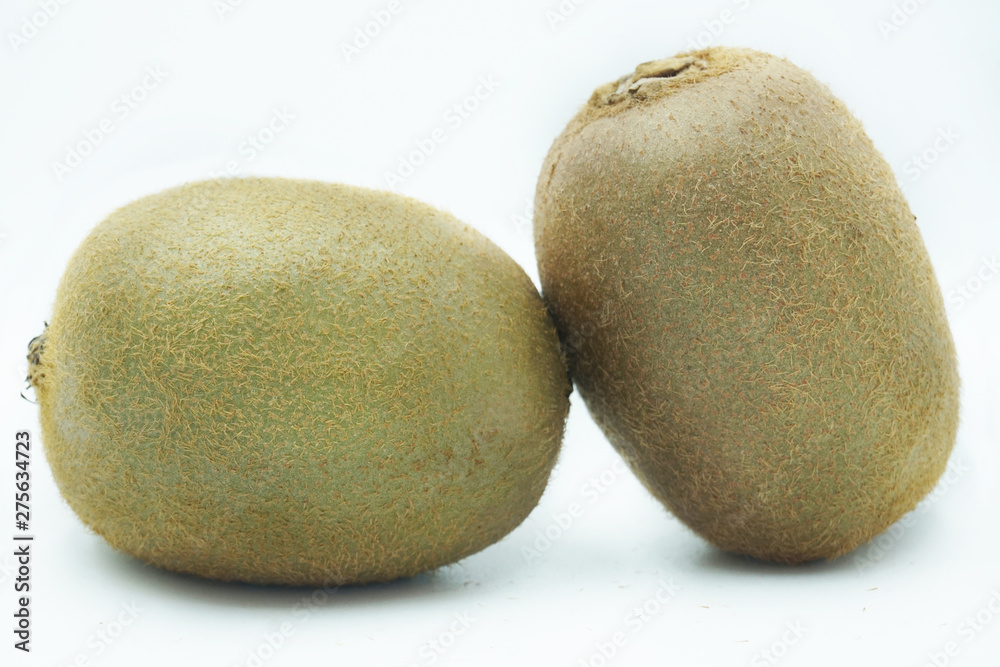 Ripe whole kiwi fruit and half kiwi fruit isolated on white background Ripe whole kiwi fruit and half kiwi fruit isolated on white background