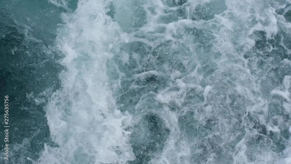 Abstract slow motion water ocean waves texture background. surface of sea wave splash and foam. Abstract slow motion water ocean waves texture background. surface of sea wave splash and foam.