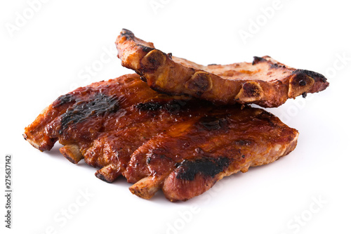 Fototapeta Grilled barbecue ribs isolated on white background.