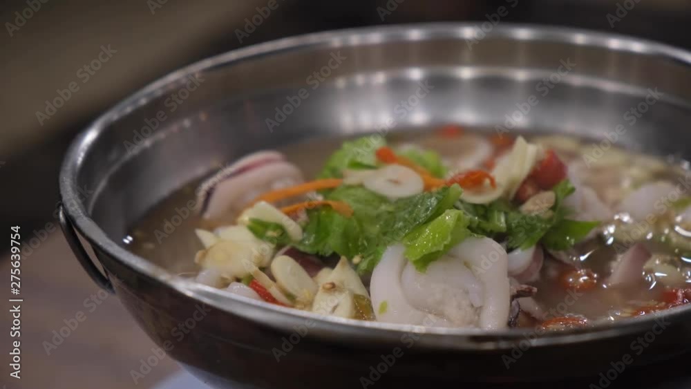 Steam squid with spicy chilli and lemon sauce. Tom Yum Pla Muk Nung Manow. Thai cuisine. Steam squid with spicy chilli and lemon sauce. Tom Yum Pla Muk Nung Manow. Thai cuisine.