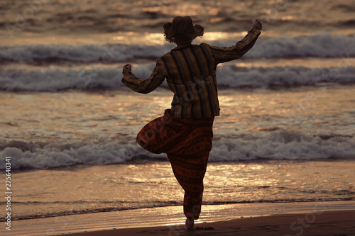 man on the beach in india, ocean, coast, vacation. rest on goa