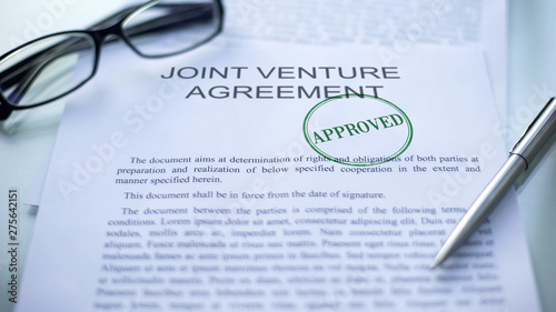 Joint venture agreement approved, seal stamped on official document, business