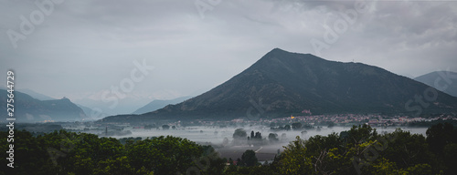 Panorama of the monte musine mountain in fog near Turin, in the north of Italy photo