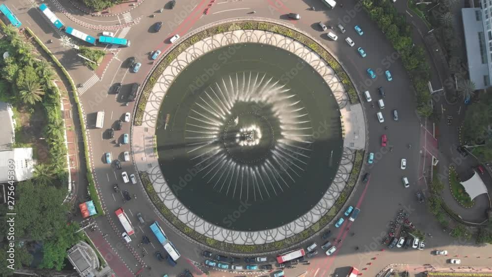 Ungraded Aerial top down view clip of Selamat Datang monument statue or Welcome monument of Jakarta, recorded in 4k resolution. Ungraded Aerial top down view clip of Selamat Datang monument statue or Welcome monument of Jakarta, recorded in 4k resolution.