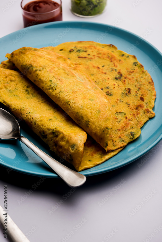 Chilla or Besan cheela is a simple pancake made with chickpea flour and some basic ingredients served with green chutney and tomato sauce, also known as veg-omelette
