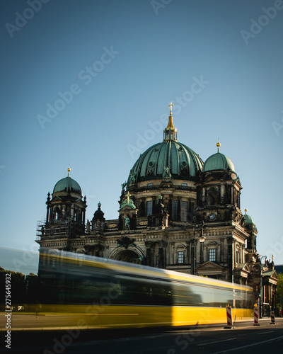 Moving bus in fron of the Berliner Dom cathedral