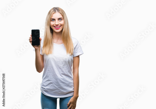 Young beautiful blonde woman showing smartphone over isolated background with a happy face standing and smiling with a confident smile showing teeth