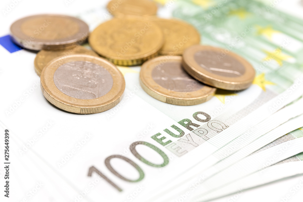 Close-up Stack of Euro banknotes and coins. 500 Euro banknotes. European currency money banknotes isolated on white backdrop. Perspective view closeup. Salary, savings, european union economic crisis Close-up Stack of Euro banknotes and coins. 500 Euro banknotes. European currency money banknotes isolated on white backdrop. Perspective view closeup. Salary, savings, european union economic crisis