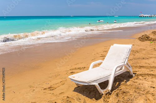 Fototapeta Naklejka Na Ścianę i Meble -  Sun lounger on the beach on Turkish Riviera near Side