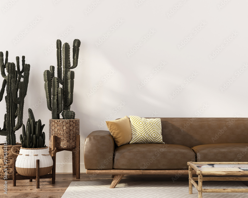 Boho-style interior with leather sofa and cacti - obrazy, fototapety, plakaty 