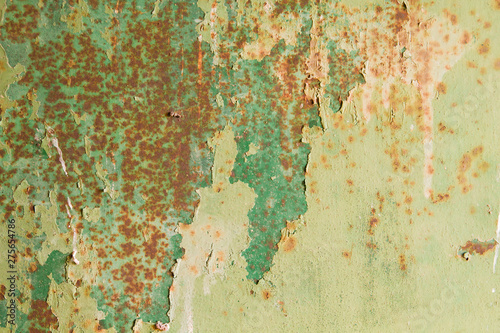 Old green rusty and distressed wall detail