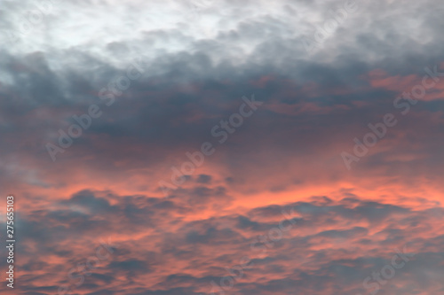 Red sky with blue clouds