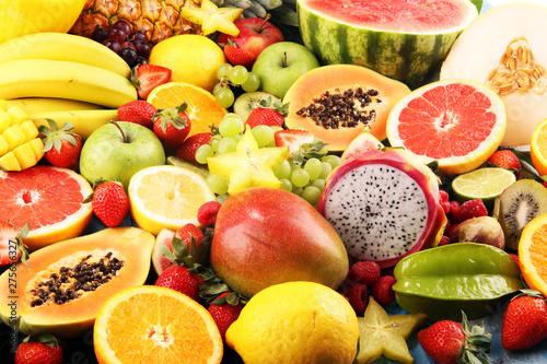 Tropical fruits background  many colorful ripe fresh tropical fruits