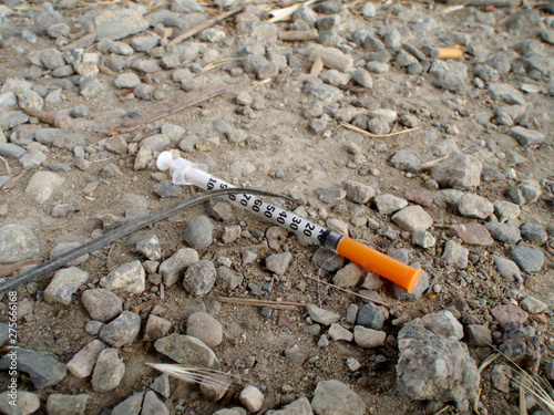 Used Drug Needle on the Ground photo