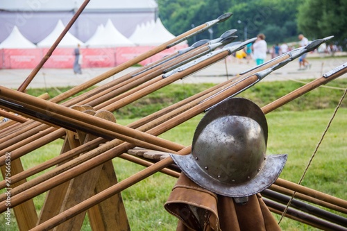 Medieval knight's helmet Morion. Old spears. Historical reconstruction. Knights tournament
