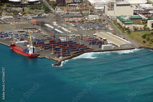 Aerial of Cargo Boat being unloaded on Pier 1, Re-Use Hawaii, Medical College, and Water Treatment Plant