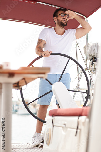 Man enjoying a summer day on a boat.