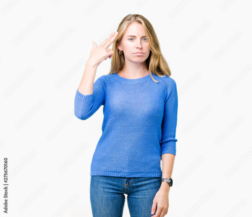 Beautiful young woman wearing blue sweater over isolated background Shooting and killing oneself pointing hand and fingers to head, suicide gesture. Beautiful young woman wearing blue sweater over isolated background Shooting and killing oneself pointing hand and fingers to head, suicide gesture.