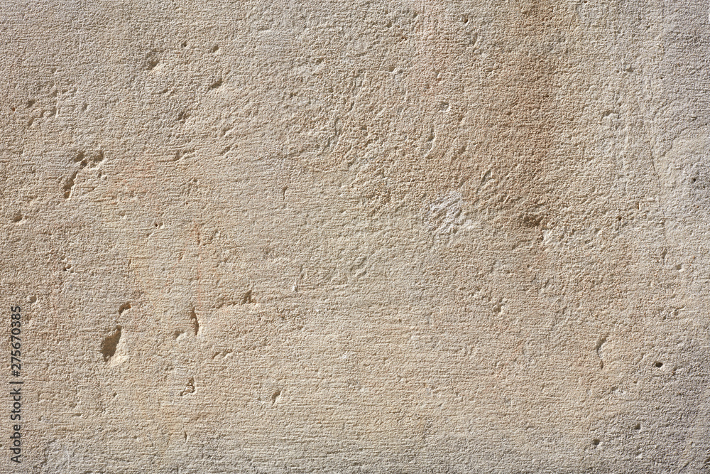 Old gray wall texture background in sunlight Old gray wall texture background in sunlight