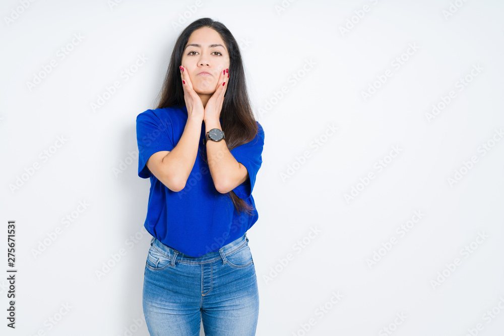 Beautiful brunette woman over isolated background Tired hands covering face, depression and sadness, upset and irritated for problem Beautiful brunette woman over isolated background Tired hands covering face, depression and sadness, upset and irritated for problem