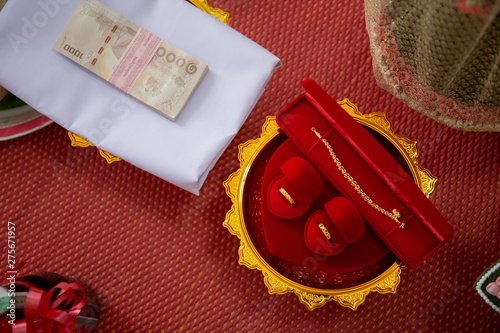 wedding golden rings necklace and money  . Thai dowry