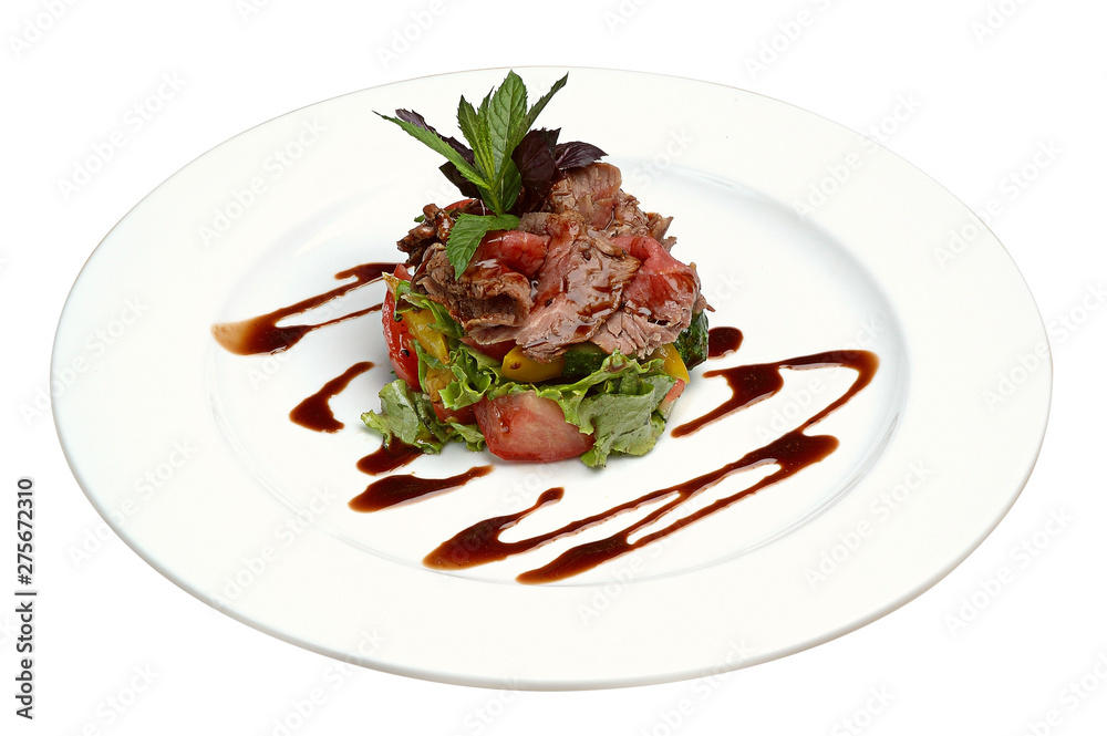 Delicious gourmet food. Meat, sliced tomatoes, basil, with soy sauce on plate on white isolated background. Close-up. Delicious gourmet food. Meat, sliced tomatoes, basil, with soy sauce on plate on white isolated background. Close-up.