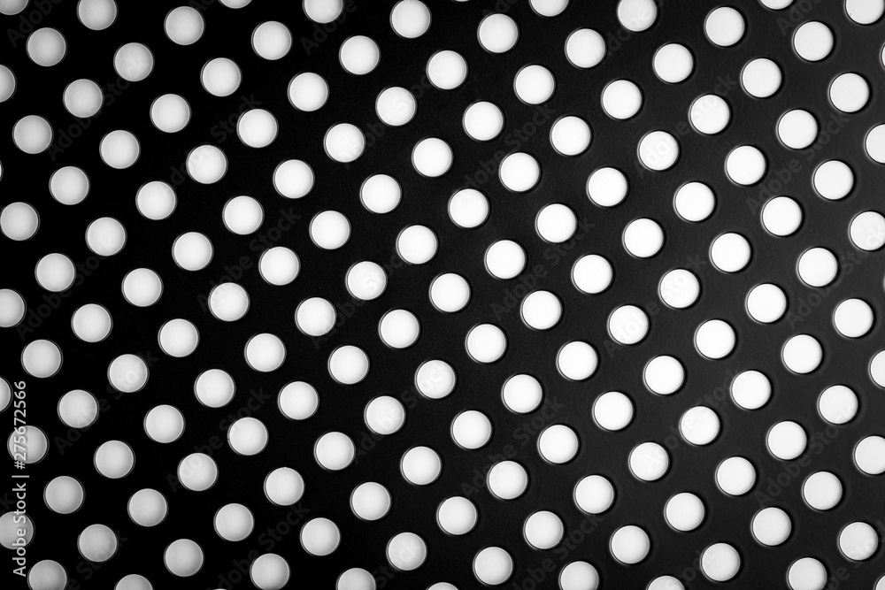 Black speaker lattice background, close-up. Black speaker lattice background, close-up.