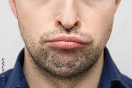 Sadness on a person's face, close up, cropped image